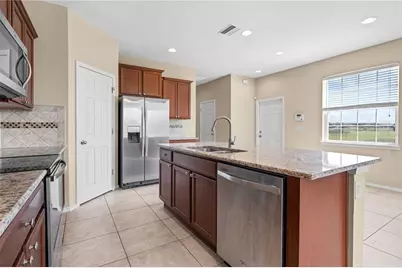 8961 Turnstone Haven Place, Tampa, FL 33619 - Photo 25