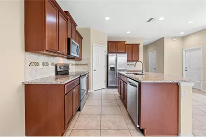 8961 Turnstone Haven Place, Tampa, FL 33619 - Photo 17