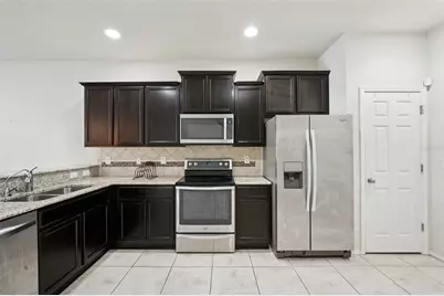 4935 White Sanderling Court, Tampa, FL 33619 - Photo 21