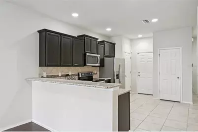 4935 White Sanderling Court, Tampa, FL 33619 - Photo 23