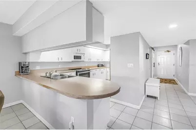 6650 Sunset Way #105, Saint Pete Beach, FL 33706 - Photo 9