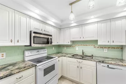 255 Dolphin Point #414, Clearwater Beach, FL 33767 - Photo 3