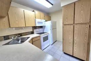 1344 Pine Ridge Cir E, Tarpon Springs, FL 34688 - Photo 11