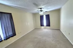 1344 Pine Ridge Cir E, Tarpon Springs, FL 34688 - Photo 25