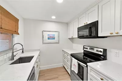 3575 Gulf Boulevard #105, Saint Pete Beach, FL 33706 - Photo 13