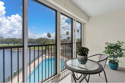 10355 Paradise Boulevard #208, Treasure Island, FL 33706 - Photo 13