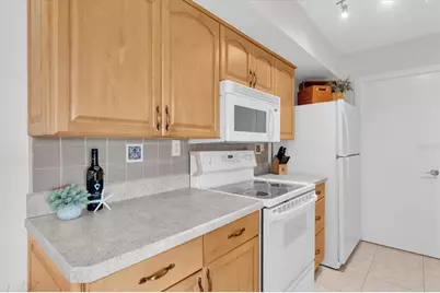 10355 Paradise Boulevard #208, Treasure Island, FL 33706 - Photo 21