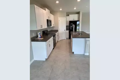 7038 Samuel Ivy Dr Drive, Tampa, FL 33619 - Photo 5