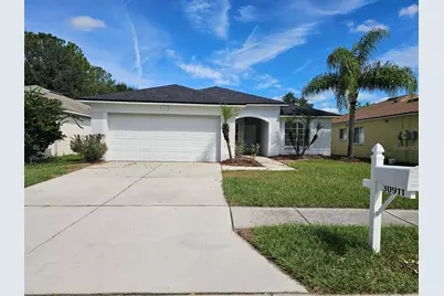 30911 Midtown Court, Wesley Chapel, FL 33545 - Photo 1