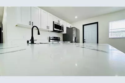 7017 Sandhurst Drive, Tampa, FL 33619 - Photo 7