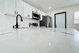 7017 Sandhurst Dr, Tampa, FL 33619 - Photo 7