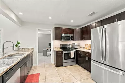 874 Pinewood Terrace W, Palm Harbor, FL 34683 - Photo 3