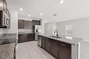 7207 Ronnie Gardens Ct, Tampa, FL 33619 - Photo 9