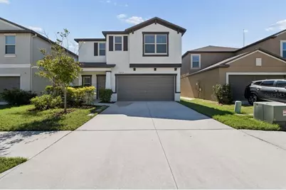 7207 Ronnie Gardens Court, Tampa, FL 33619 - Photo 1