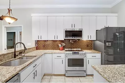 8705 Crescent Forest Boulevard, New Port Richey, FL 34654 - Photo 27