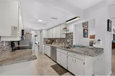 2023 El Rancho Drive, Sun City Center, FL 33573 - Photo 13