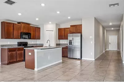 4103 Globe Thistle Drive, Tampa, FL 33619 - Photo 5