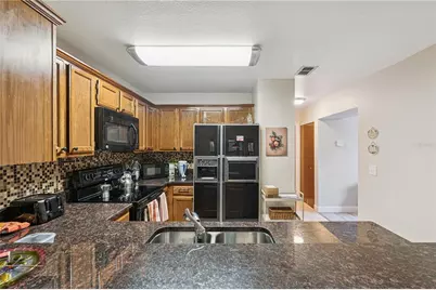 5437 Wincrest Court, Orlando, FL 32812 - Photo 13