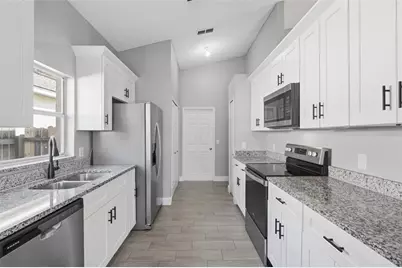 5057 Mallard Pond Court, Orlando, FL 32808 - Photo 27