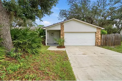 4027 Woodsong Drive, Orlando, FL 32817 - Photo 1