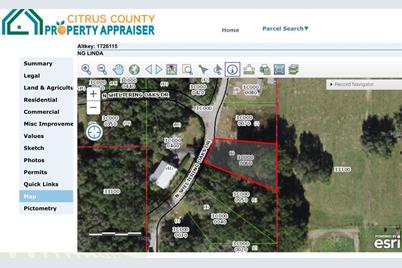 47 N Sheltering Oaks Drive, Inverness, FL 34453 - Photo 1