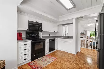 303 Old Mill Pond Road #303, Palm Harbor, FL 34683 - Photo 7