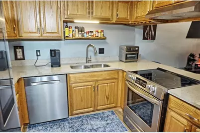 1775 Cupecoy Circle #O4, Lutz, FL 33558 - Photo 13