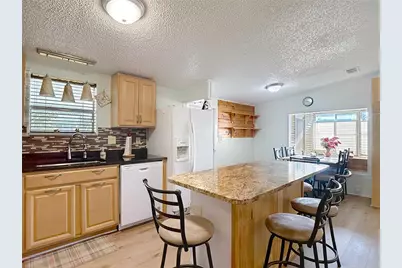 10033 Wellington Avenue, Dade City, FL 33525 - Photo 13