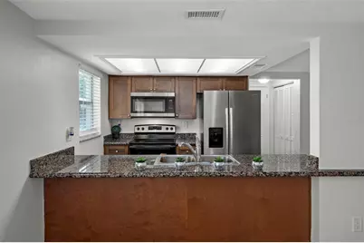 7801 Raintree Drive, New Port Richey, FL 34653 - Photo 15