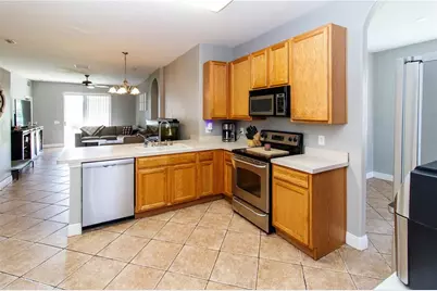 27211 Liriope Court, Wesley Chapel, FL 33544 - Photo 7