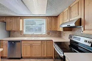 9610 Rainbow Ln, Port Richey, FL 34668 - Photo 11