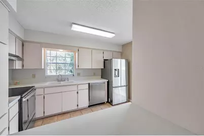 6632 Hickorywood Lane #4B, New Port Richey, FL 34653 - Photo 11