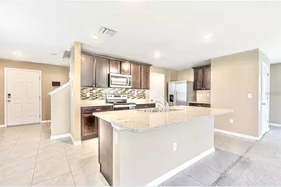 13648 Whiskey Daisy Drive, Dade City, FL 33525 - Photo 7