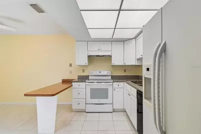 1130 Orange Tree Circle W #C, Palm Harbor, FL 34684 - Photo 7