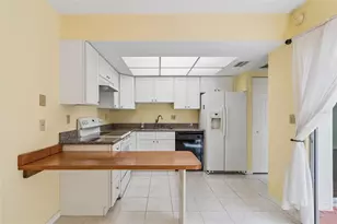 1130 Orange Tree Cir W, Palm Harbor, FL 34684 - Photo 9