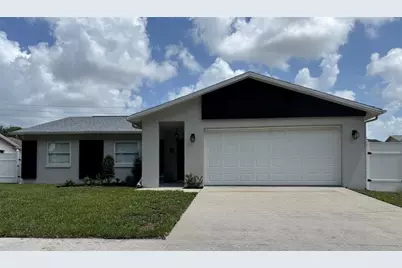 8625 Woodcrest Drive, Port Richey, FL 34668 - Photo 1