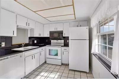 1370 Heather Ridge Boulevard #102, Dunedin, FL 34698 - Photo 11