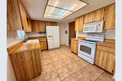 8634 Winding Wood Drive, Port Richey, FL 34668 - Photo 13