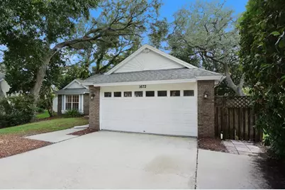 1672 Countrywood Street, Tarpon Springs, FL 34689 - Photo 1