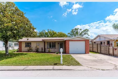 7024 Mayfield Drive, Port Richey, FL 34668 - Photo 1