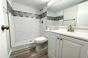 1182 Pine Ridge Cir W, Tarpon Springs, FL 34688 - Photo 19