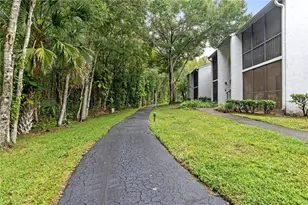 1182 Pine Ridge Cir W, Tarpon Springs, FL 34688 - Photo 25