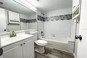 1182 Pine Ridge Cir W, Tarpon Springs, FL 34688 - Photo 13