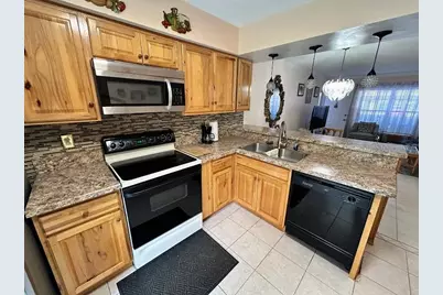 4916 Sunnybrook Drive #14, New Port Richey, FL 34653 - Photo 9