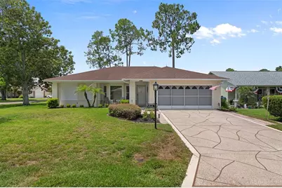 7196 Crown Oaks Drive, Spring Hill, FL 34606 - Photo 1
