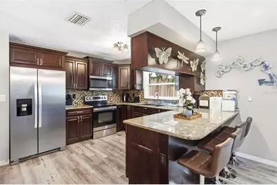 2460 Beacon Groves Boulevard, Palm Harbor, FL 34683 - Photo 17