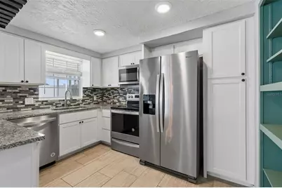 2222 Arcadia Road, Holiday, FL 34690 - Photo 13