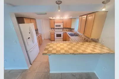 7741 Treasure Pointe Drive, Port Richey, FL 34668 - Photo 11
