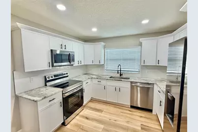1202 Mandarin Drive, Holiday, FL 34691 - Photo 7