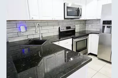 1735 Cupecoy Circle #L-1, Lutz, FL 33558 - Photo 3
